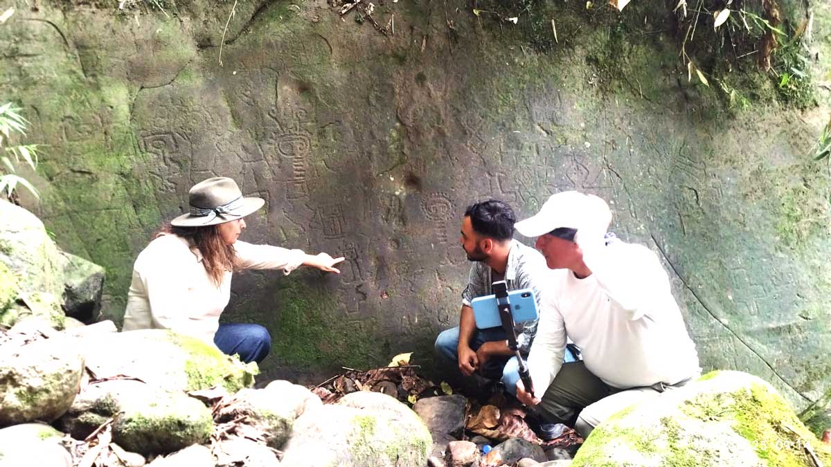 Ruth Ordóñez, INPC Zone 6 Director, with newly identified petroglyphs in the Santiago de Méndez area. Courtesy.