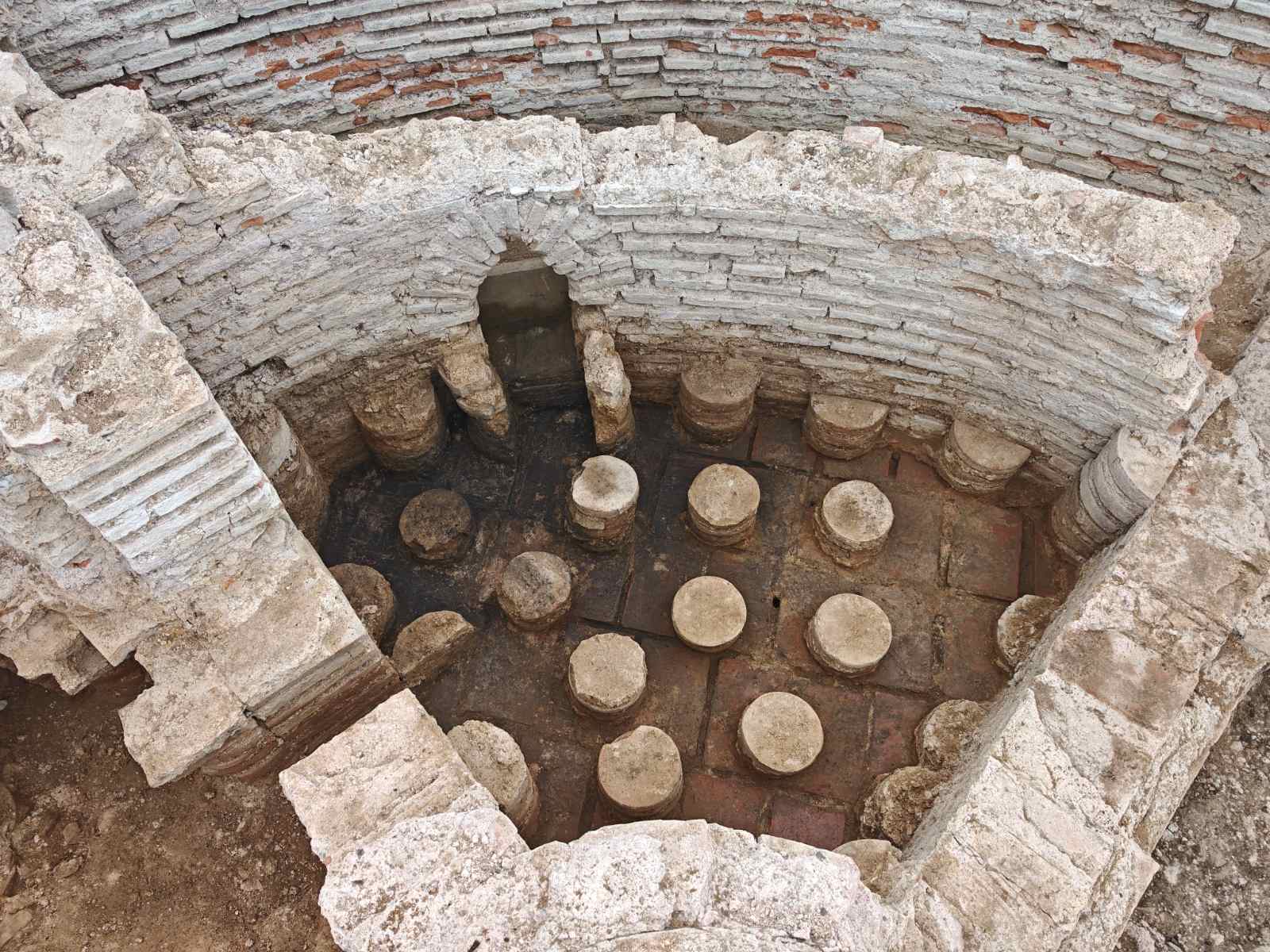 Well-preserved hypocaust pilae supporting the raised floor of the Roman bath at Vrelo&ndash;&Scaron;arkamen; caption credit Marija Jović / Arkeonews with same source URL