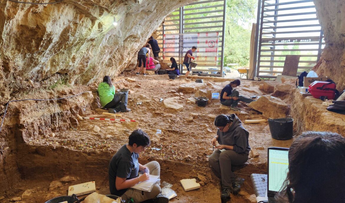 Archaeologists excavating Neanderthal sublevel 4D at Prado Vargas Cave, Ojo Guareña, Burgos
