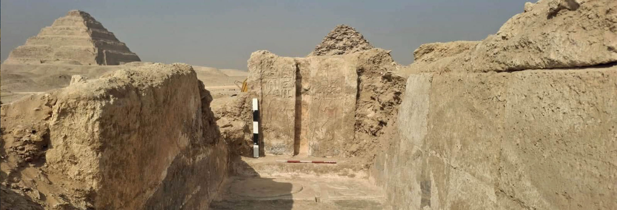 Tomb of Sekhentio-Ptah in the Bubasteion Necropolis at Saqqara, with the Step Pyramid visible behind it